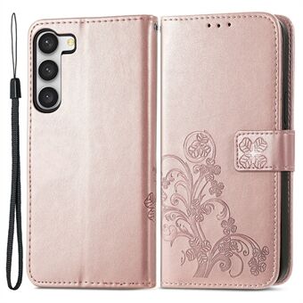 Til Samsung Galaxy S23 PU læder firkløver præget telefontaske Stødsikker magnetlås Stand Pung telefoncover med håndledsrem
